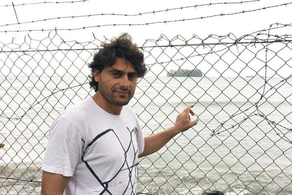 'Writing for his life': Manus Island detainee Farhad Bandesh releases soaring new song