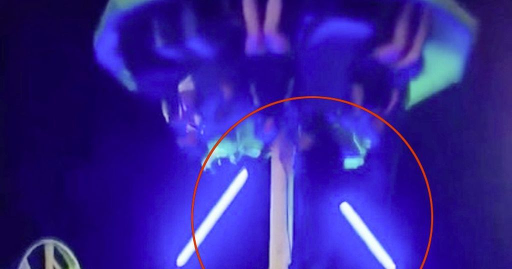 Terrifying moment woman falls from funfair ride after…
