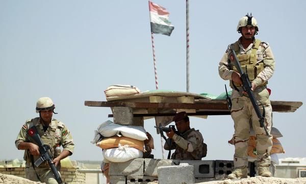 Biden calls Iraqi PM to calm outcry over Carter remarks on fight against Isis