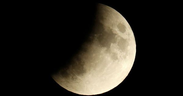 Partial lunar eclipse visible from UK as Earth passes between sun and moon