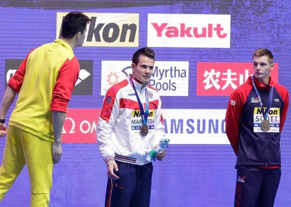 Swimming: China's Sun wins 200 free via DQ, gets shunned on podium