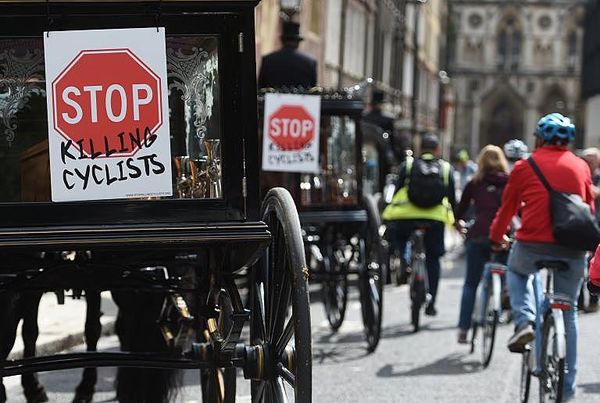 Cyclists stage 'funeral procession' through London to highlight bike rider deaths