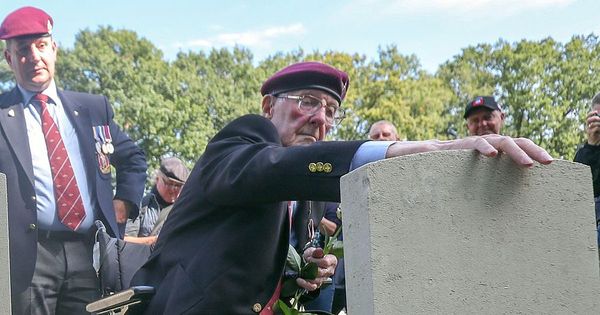 Scottish World War 2 hero Sandy Cortmann hugs lost pal's grave at emotional Arnhem service