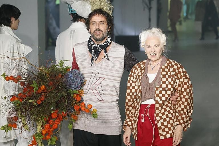 Model walks the Vivienne Westwood runway in a giant fish hat at