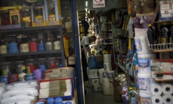 Greek firms fear slow death as bank freeze cuts off imports