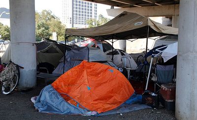 Governor Launches Camp, Backs ‘Mega-Tent’ for Austin’s Homeless, Surprising Advocates