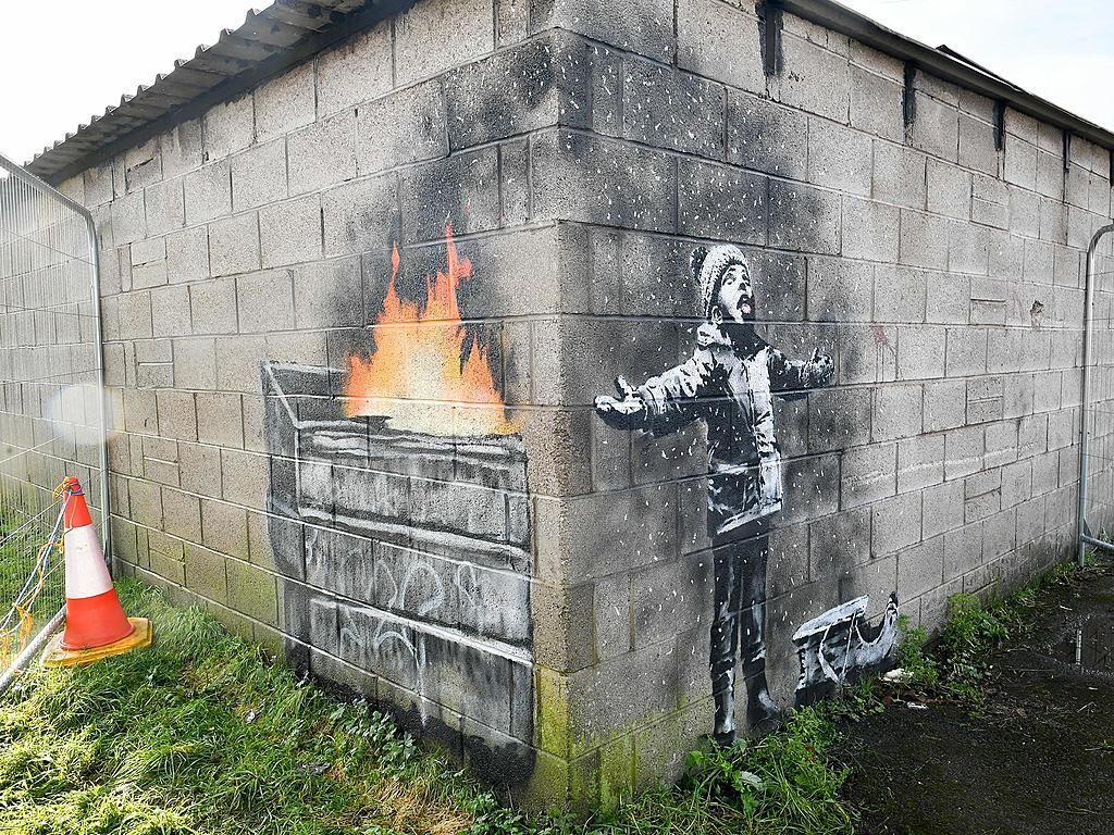 Banksy's photographer reveals why graffiti artist has…