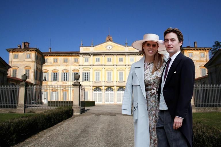 An Italian princess standing in front of her historic family palace.