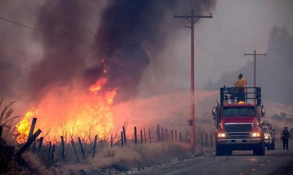 'It's unrelenting': inside the Washington town surrounded by raging wildfires