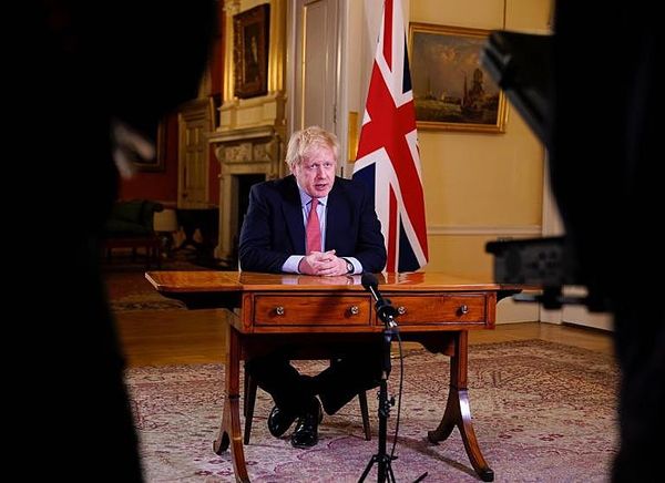 Boris Johnson faces calls for clarity after ordering three-week lockdown and giving police powers to enforce measures