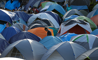 In Migrants Camps Along the Texas-Mexico Border, Close Quarters and Closing Borders Raise Concerns