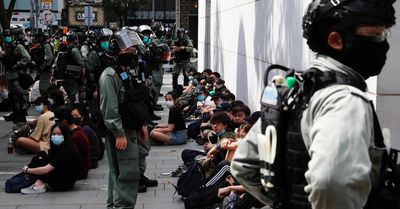 Hong Kong Police Blockade Legislature Ahead of National Anthem Vote