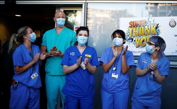 UK government orders expanded use of face masks in English hospitals