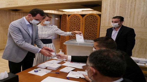 Syria votes for new parliament amid war, economic woes
