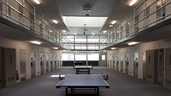 Pressure mounts for release of low-risk inmates as tensions run high in Victoria's locked-down jails