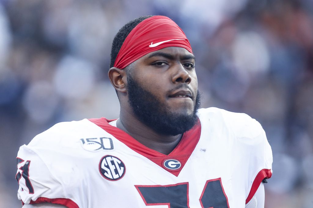 Former UGA LT Andrew Thomas signs life-changing…
