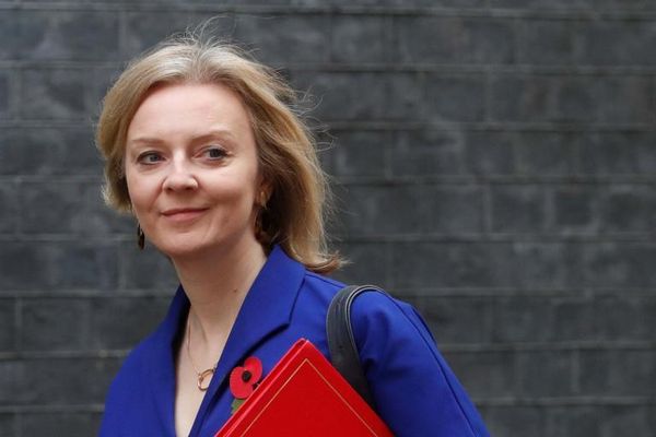 Liz Truss says Tony Abbott's views on women and LGBT issues are 'irrelevant' as former Australian PM tipped for top UK trade job